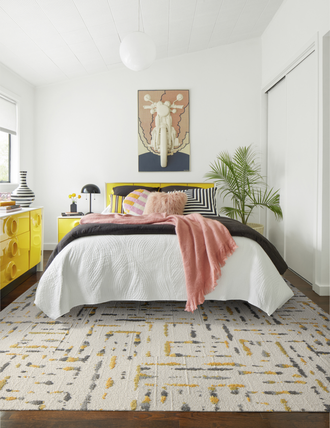 FLOR Lilting bedroom area rug shown in Marigold